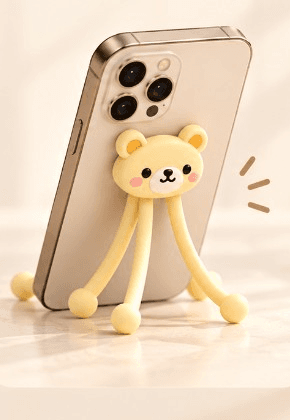 Phone standing at an angle on Bendi Bear's bent legs